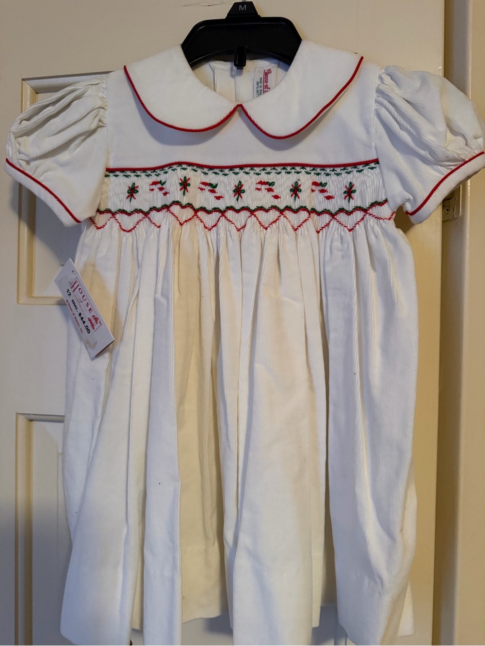 White Smocked Girls' Dress with Red Trim and Floral Embroidery